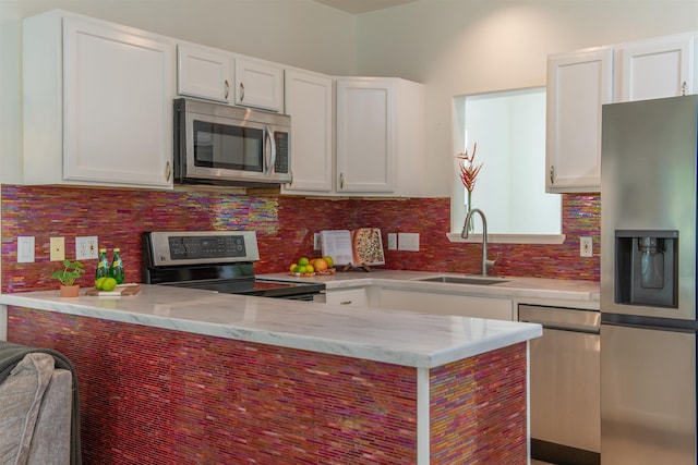 568 Hana Hwy Unit B, Paia, HI 96779 - kitchen featuring stainless steel appliances, a sink, and white cabinets