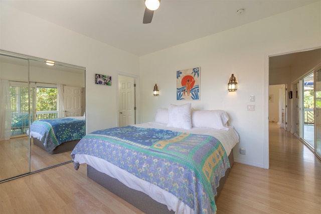 568 Hana Hwy Unit B, Paia, HI 96779 - bedroom featuring wood finished floors, baseboards, and ceiling fan
