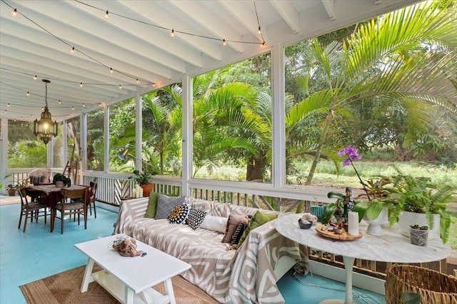 568 Hana Hwy Unit B, Paia, HI 96779 - sunroom with outdoor dining area, an outdoor living space, plenty of natural light, and beam ceiling