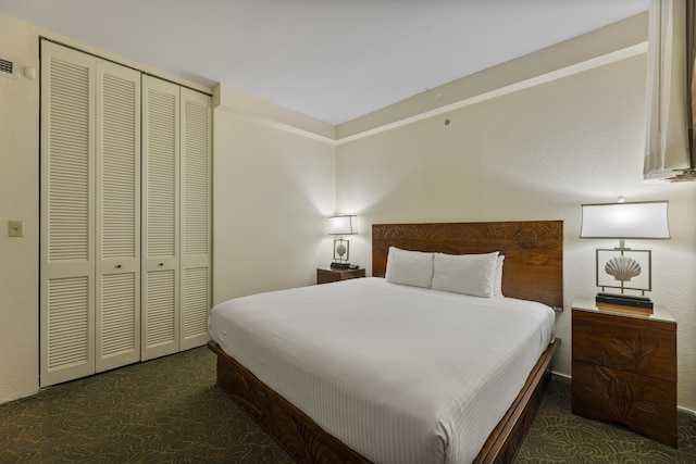 carpeted bedroom with a closet