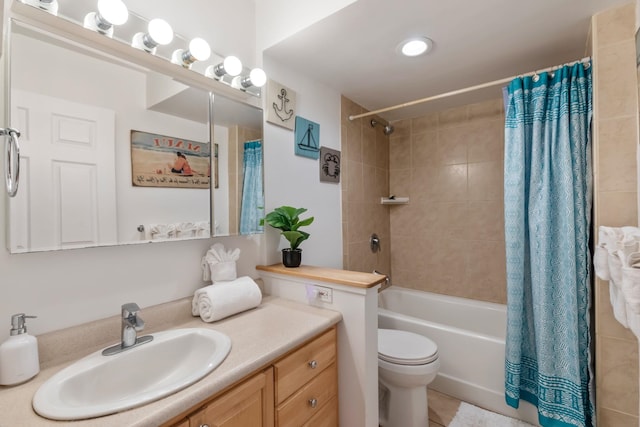 full bathroom with shower / bath combination with curtain, tile floors, toilet, and vanity