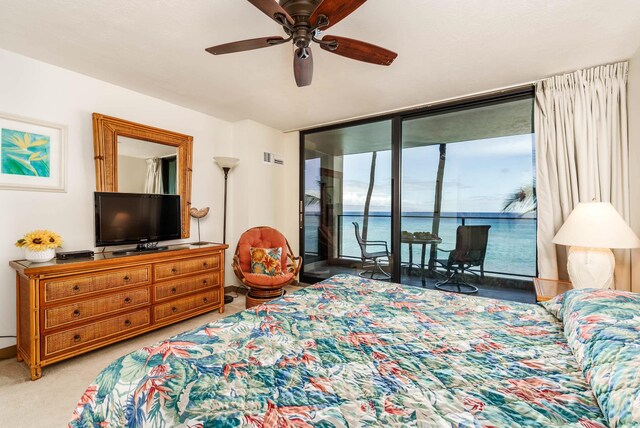 bedroom featuring carpet flooring, ceiling fan, and access to exterior