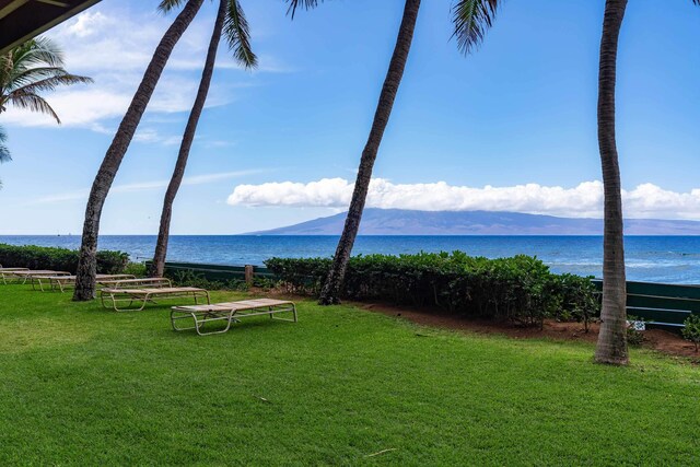 exterior space featuring a water and mountain view