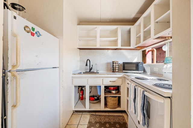 kitchen with open shelves, a sink, tasteful backsplash, white appliances, and light tile patterned floors