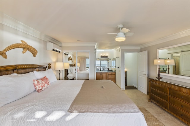 bedroom with a wall mounted air conditioner, ornamental molding, ceiling fan, a barn door, and a closet