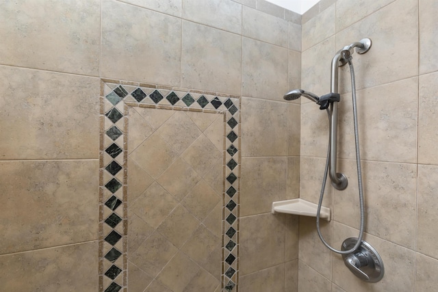 details with a tile shower