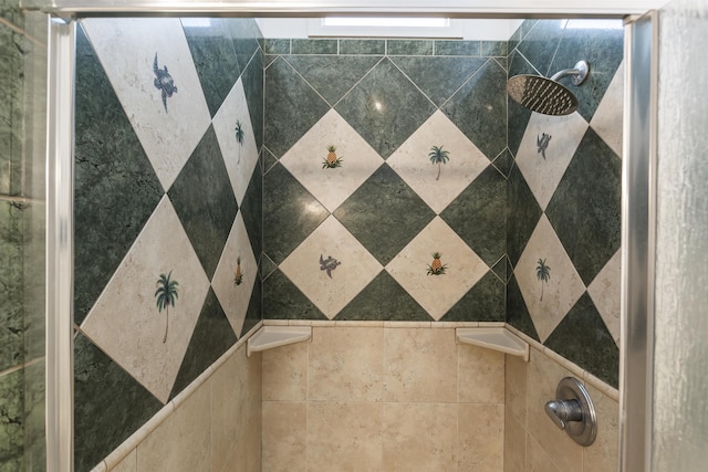 interior details featuring tiled shower