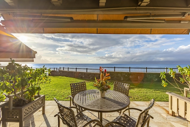 view of patio featuring a water view