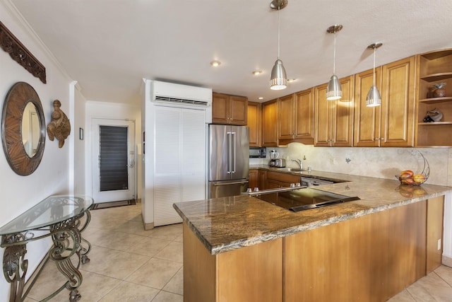 kitchen with kitchen peninsula, high end fridge, black electric cooktop, a wall mounted AC, and pendant lighting