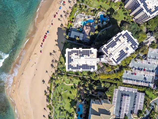 bird's eye view with a view of the beach and a water view