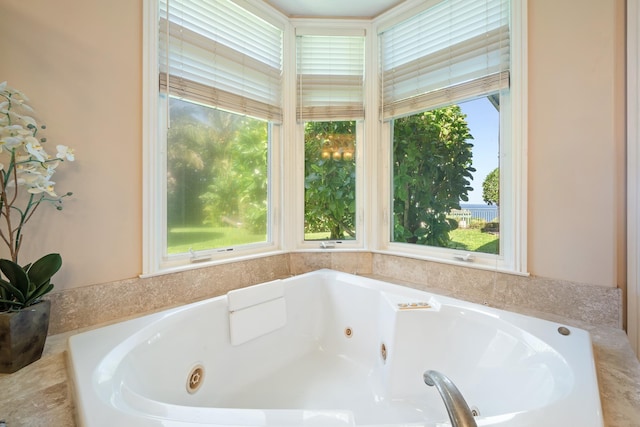 bathroom with tiled tub