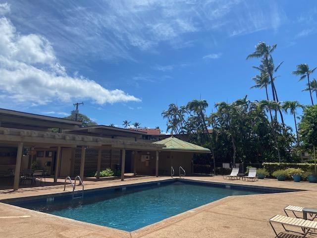 pool with a patio area