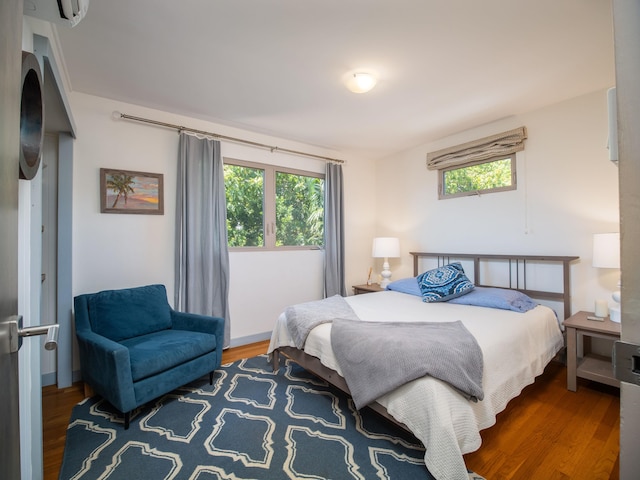 bedroom featuring wood-type flooring