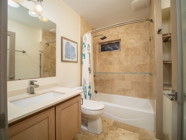 full bathroom featuring shower / bathtub combination with curtain, tile patterned floors, vanity, and toilet