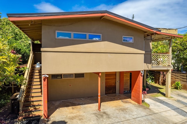 back of property featuring a patio area