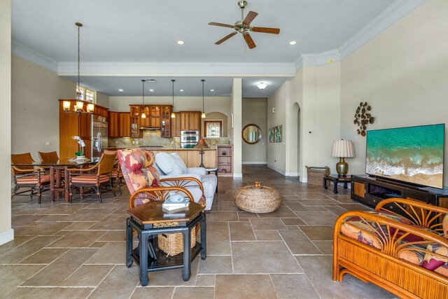 1387 Hihimanu St Unit 16, Kihei, HI 96753 - living room with crown molding and ceiling fan with notable chandelier