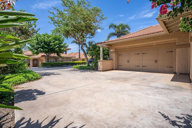 1387 Hihimanu St Unit 16, Kihei, HI 96753 - view of side of property with a garage