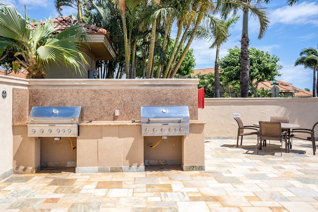 1387 Hihimanu St Unit 16, Kihei, HI 96753 - view of patio / terrace featuring exterior kitchen and a grill