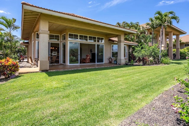 1387 Hihimanu St Unit 16, Kihei, HI 96753 - rear view of house with a yard