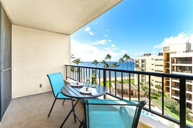 balcony featuring a water view