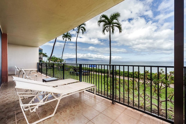 balcony featuring a water view