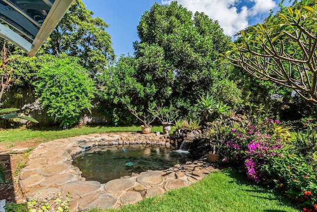 view of yard featuring fence