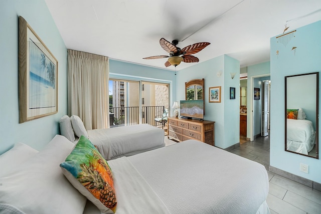 tiled bedroom with access to outside and ceiling fan