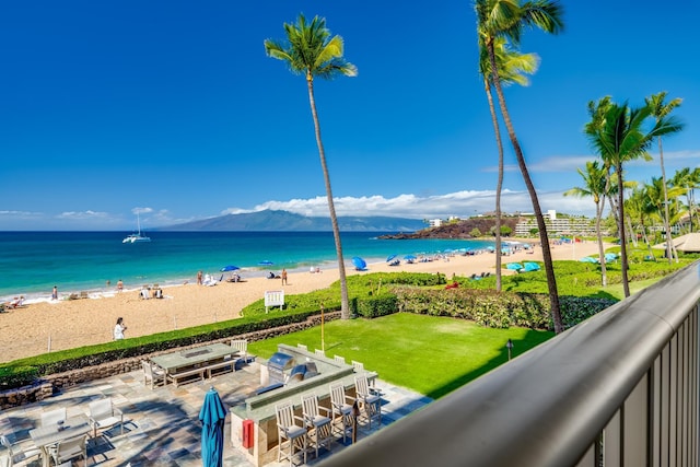 property view of water featuring a beach view