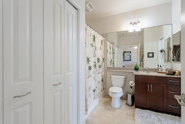 full bathroom featuring toilet, a shower with shower curtain, tile patterned flooring, and vanity