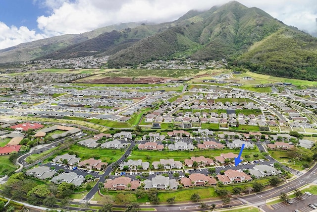 drone / aerial view featuring a residential view and a mountain view