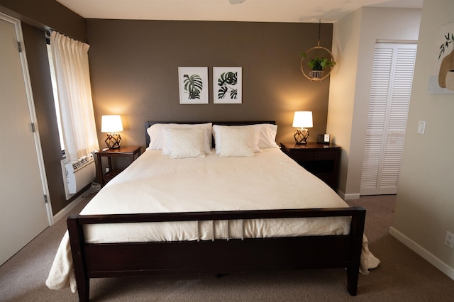 carpeted bedroom featuring a closet