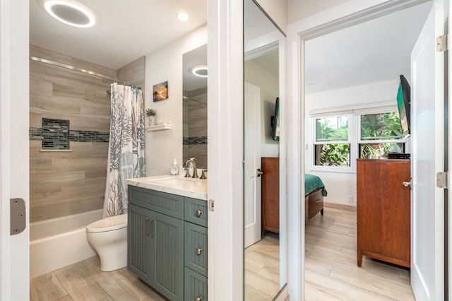 1299 Uluniu Rd Unit 106C, Kihei, HI 96753 - full bath with vanity, shower / bathtub combination with curtain, and wood finished floors