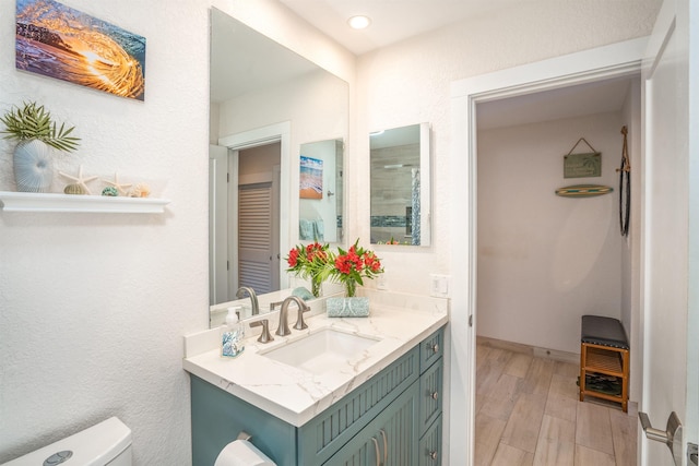 1299 Uluniu Rd Unit 106C, Kihei, HI 96753 - bathroom with vanity and wood finished floors