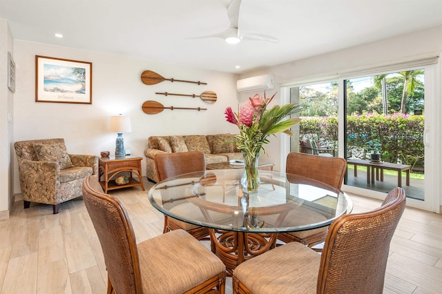 1299 Uluniu Rd Unit 106C, Kihei, HI 96753 - dining area with a wall unit AC, light wood-type flooring, ceiling fan, and recessed lighting
