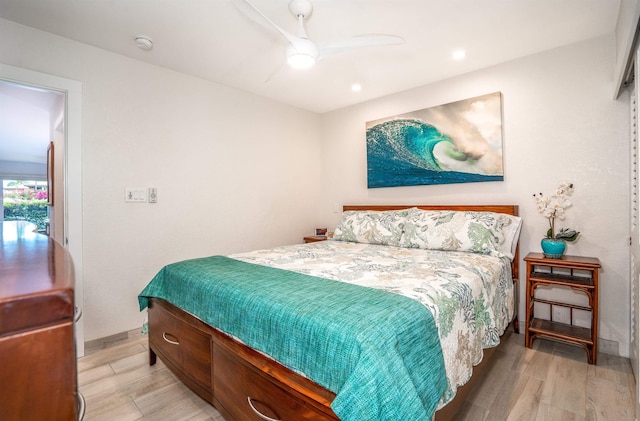 1299 Uluniu Rd Unit 106C, Kihei, HI 96753 - bedroom with light wood-style flooring and ceiling fan