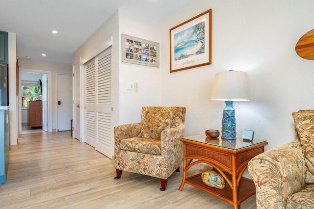 1299 Uluniu Rd Unit 106C, Kihei, HI 96753 - living area with light wood-style floors and recessed lighting