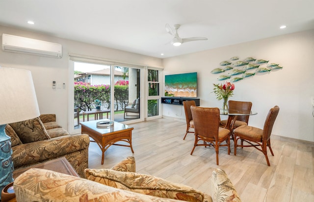 1299 Uluniu Rd Unit 106C, Kihei, HI 96753 - living room with a wall mounted air conditioner, light wood finished floors, recessed lighting, and ceiling fan