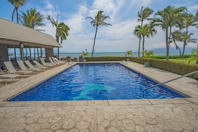 7146 Kamehameha V Hwy Unit C107, Kaunakakai, HI 96748 - community pool featuring a patio area and a water view
