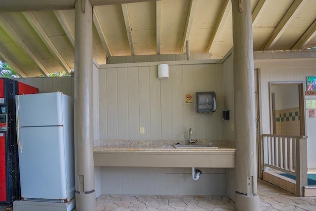 7146 Kamehameha V Hwy Unit C107, Kaunakakai, HI 96748 - miscellaneous room featuring a sink and wood walls