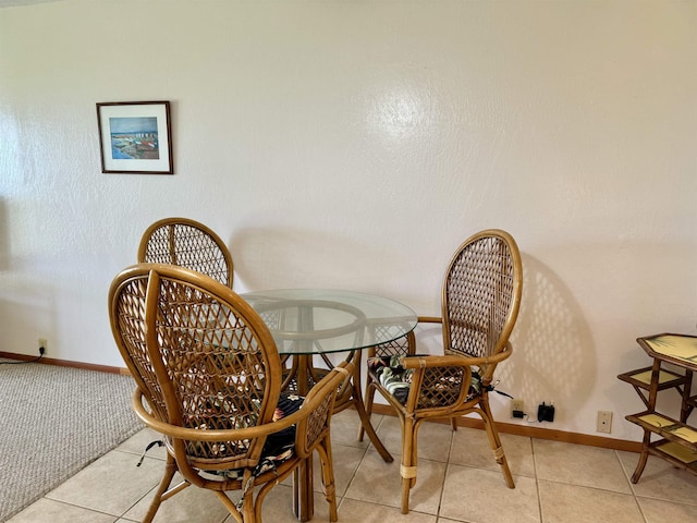 7146 Kamehameha V Hwy Unit C107, Kaunakakai, HI 96748 - dining area featuring baseboards and light tile patterned flooring