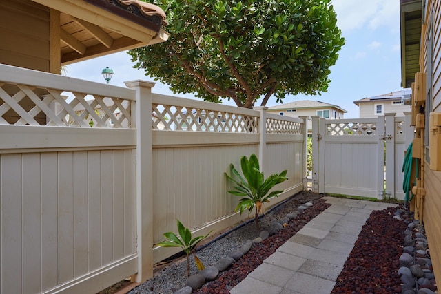 62 Meheu Cir, Kahului, HI 96732 - view of patio / terrace with fence and a gate