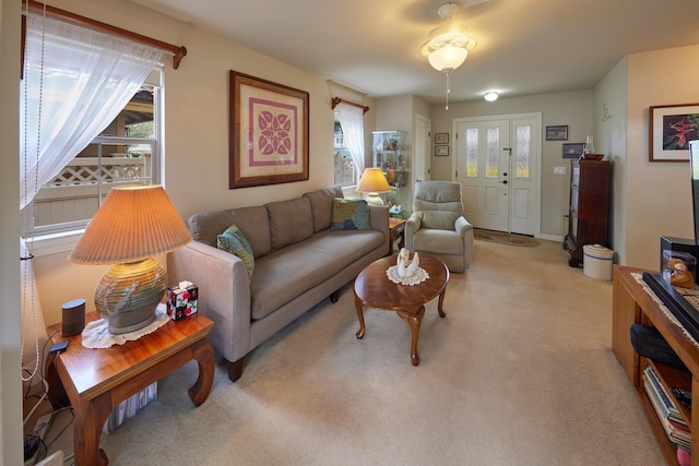 62 Meheu Cir, Kahului, HI 96732 - living room with plenty of natural light and light colored carpet