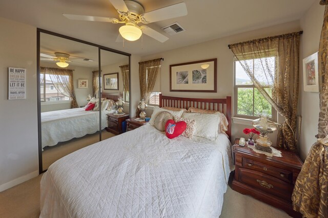 62 Meheu Cir, Kahului, HI 96732 - carpeted bedroom featuring a closet, baseboards, a ceiling fan, and visible vents