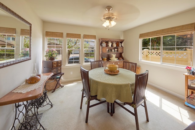 62 Meheu Cir, Kahului, HI 96732 - carpeted dining area with baseboards and a ceiling fan