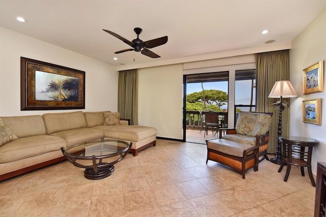 tiled living room with ceiling fan