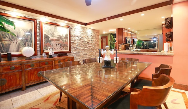 dining space featuring ceiling fan