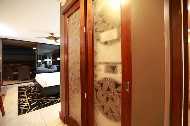 hall with light tile patterned flooring