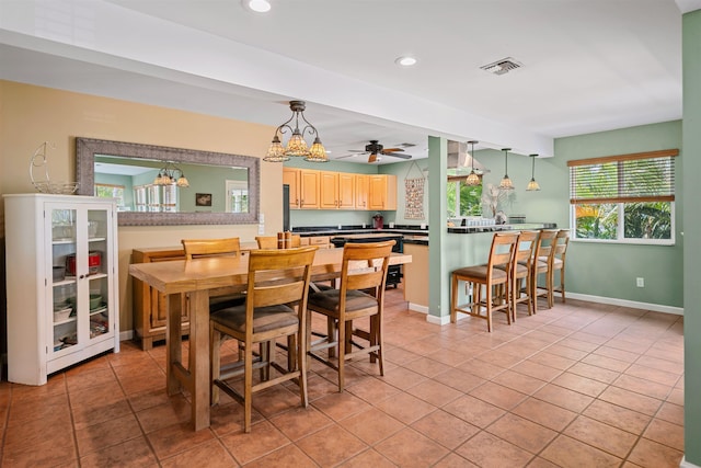 473 Kalalau Pl, Kihei, HI 96753 - dining area featuring a chandelier, recessed lighting, baseboards, and light tile patterned flooring
