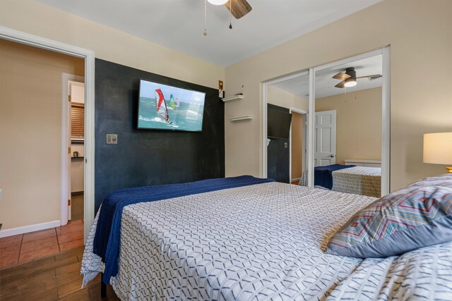 473 Kalalau Pl, Kihei, HI 96753 - bedroom with wood finished floors, a ceiling fan, a closet, and baseboards