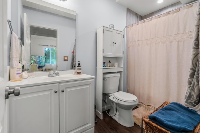 473 Kalalau Pl, Kihei, HI 96753 - bathroom featuring toilet, vanity, wood finished floors, and a shower with curtain